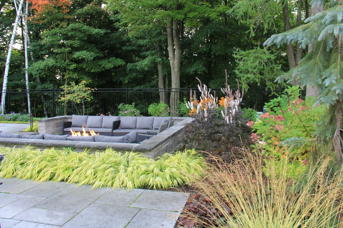 Sunken fire lounge woven into planting and stone terraces — Chesswood archive photograph IMG_7009