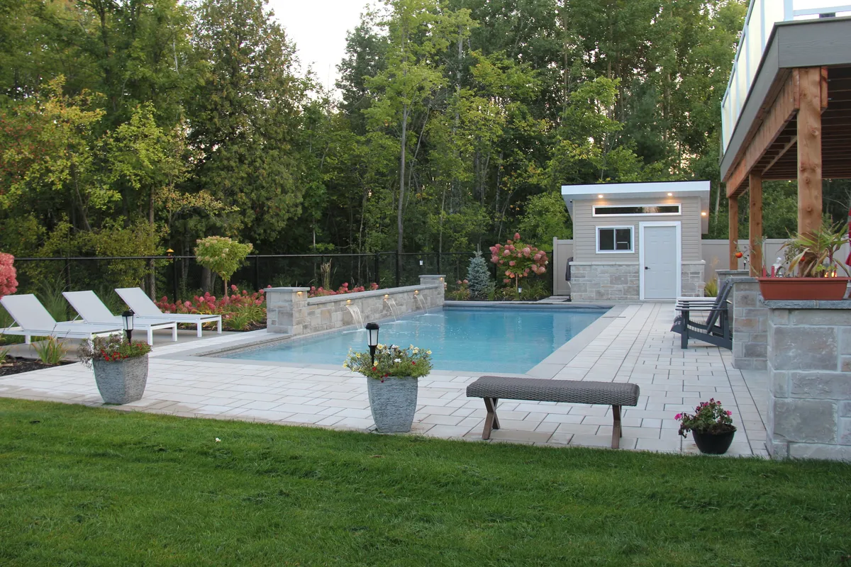 Astrolabe pool, waterfall and modern pool house