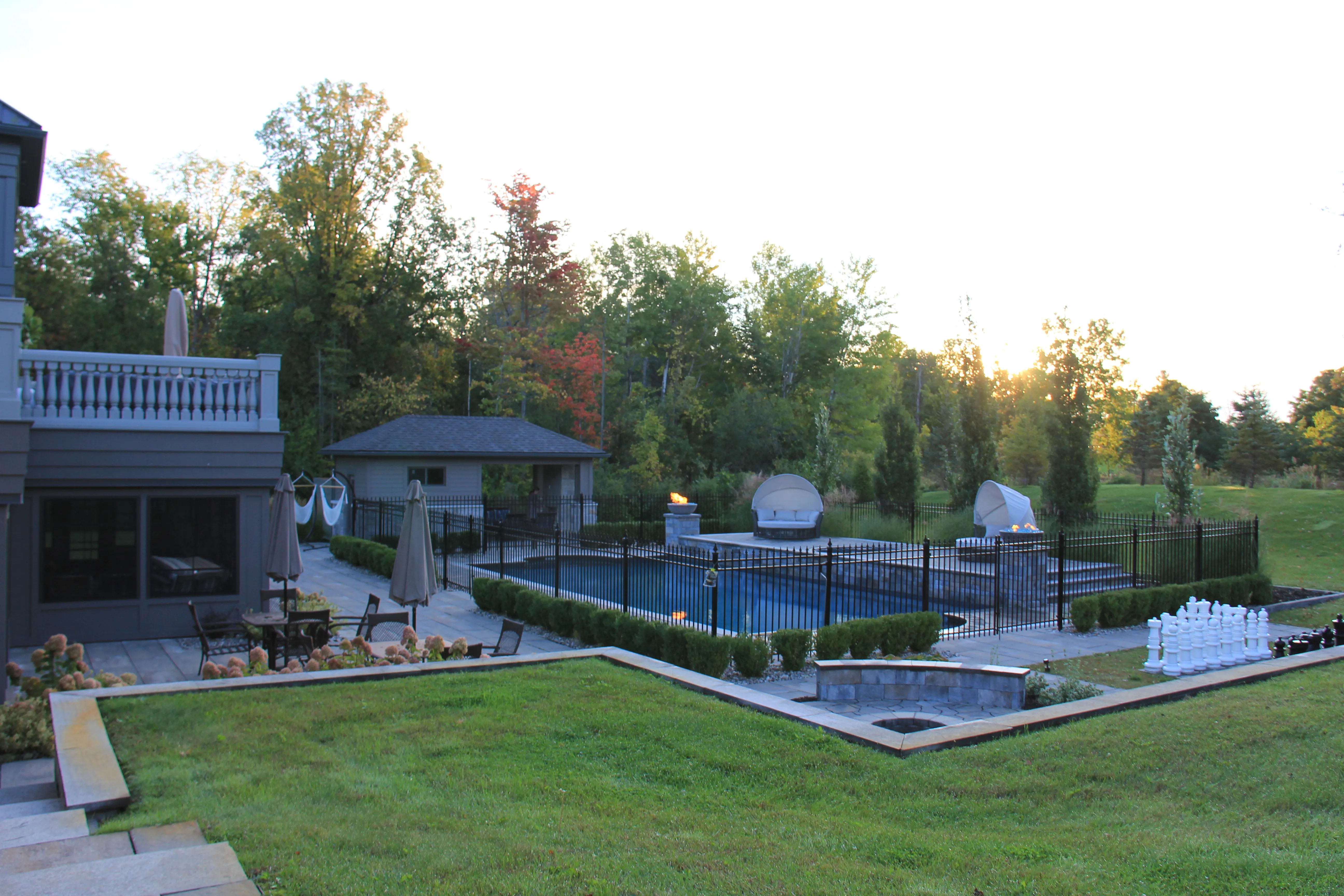Osmond Daly Estate pool, stone terraces and fire bowls