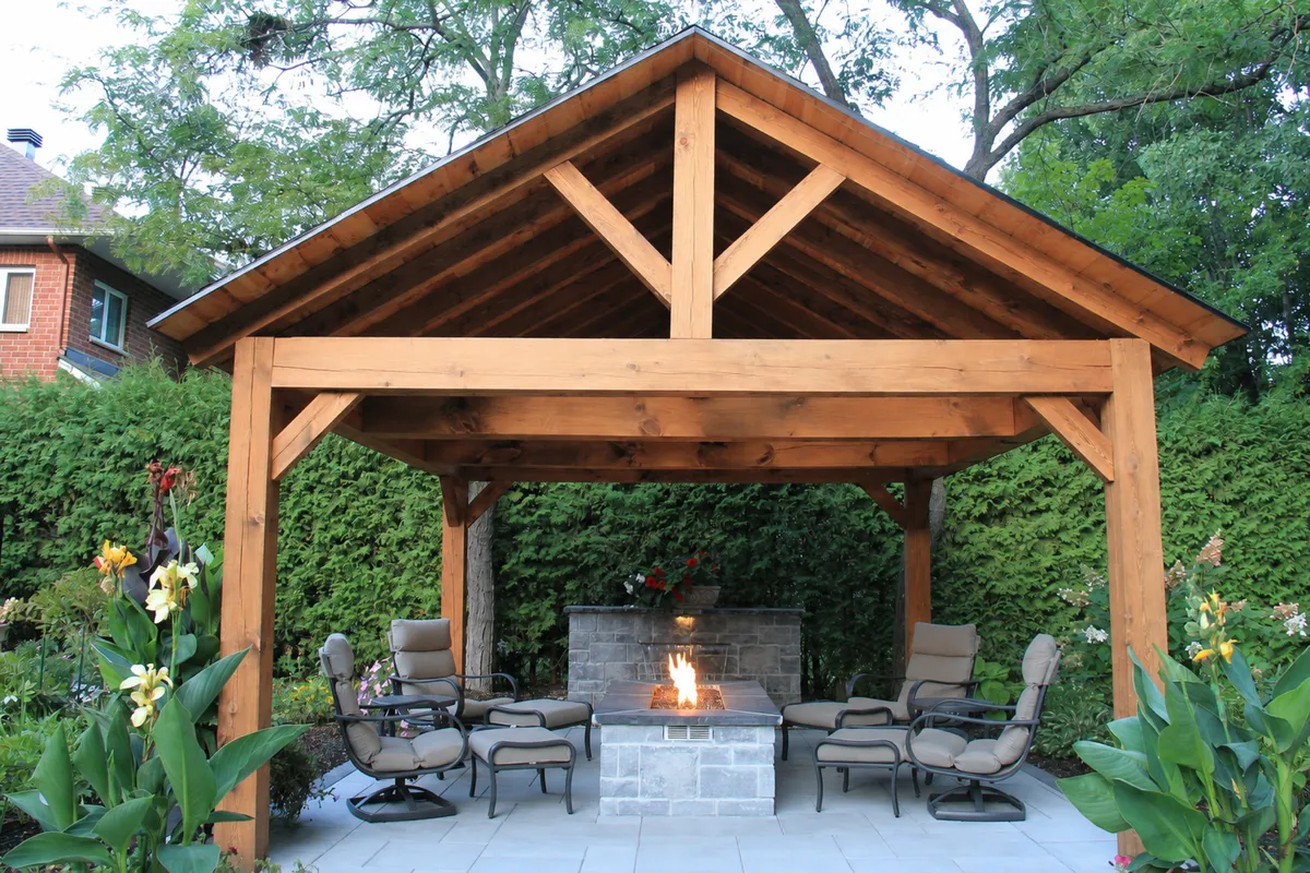 Rivercrest cedar pavilion and stone fireplace