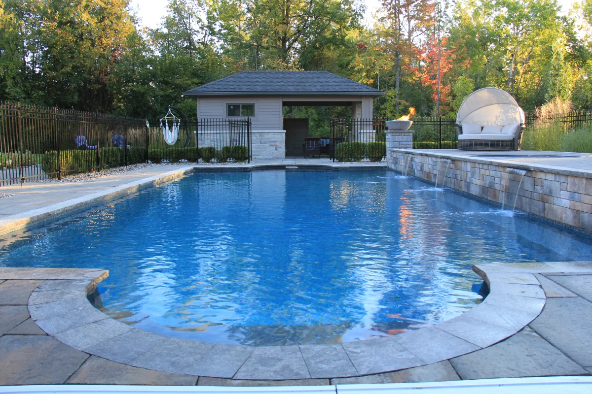 Osmond Daly curved estate pool and stone retaining wall