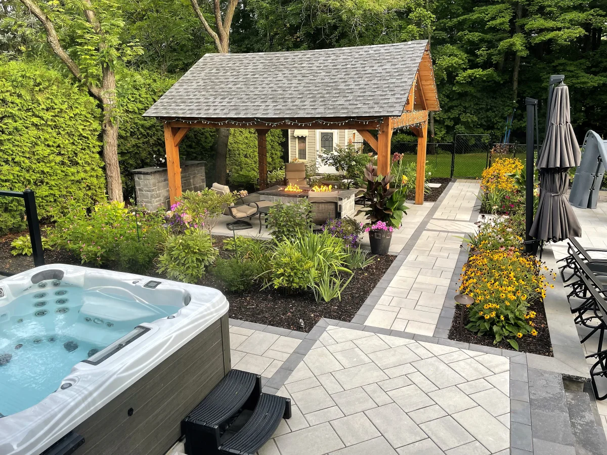 Rivercrest spa, interlock path, cabana and planted pool garden