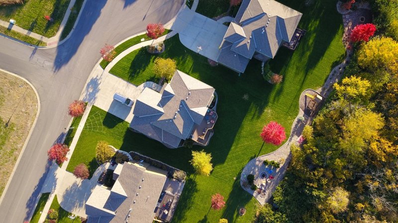 Aerial view of suburban street with homes